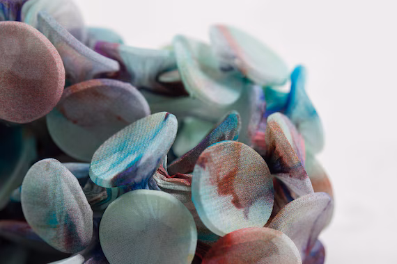Close-up of textile-based beaded embroidery jewelry
