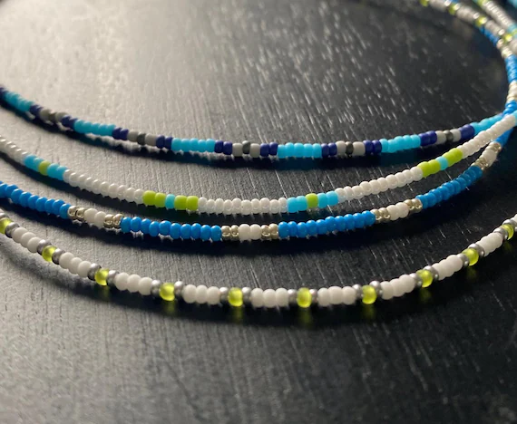 Close-up of handmade glass bead embroidery jewelry