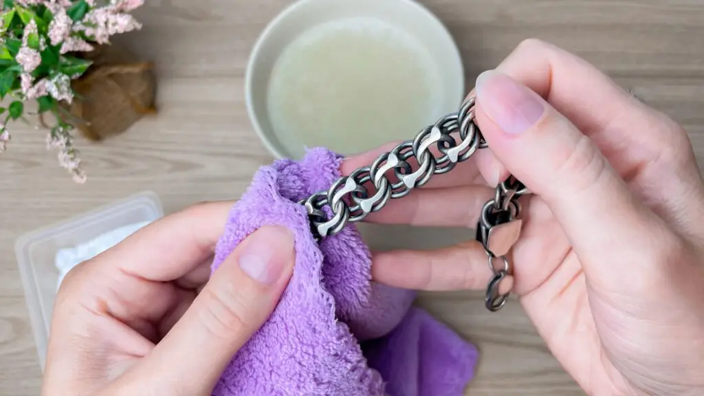 Close-up of cleaning and caring for metal jewelry